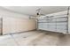 Garage features an automatic door, and storage cabinets at 1245 E Waterview Pl, Chandler, AZ 85249