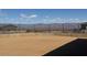 Desert backyard showcasing desert view and iron fence at 13382 E Sand Hills Rd, Scottsdale, AZ 85255