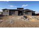 New construction home featuring a neutral color palette, tile roof, and desert landscape at 13382 E Sand Hills Rd, Scottsdale, AZ 85255