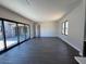 Bright, open living area with tile floors, large glass patio doors and modern style windows at 13382 E Sand Hills Rd, Scottsdale, AZ 85255
