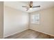 Well-lit bedroom with ceiling fan and shuttered window at 13416 S 47Th St, Phoenix, AZ 85044