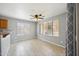 Inviting dining room with tile flooring, neutral walls, and a ceiling fan at 13416 S 47Th St, Phoenix, AZ 85044