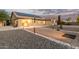 Back exterior displaying the paved patio and backyard at 136 N 236Th Ave, Buckeye, AZ 85396