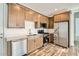 Well-equipped kitchen with stainless steel appliances, ample cabinetry, and stylish countertops at 15760 W Pioneer St, Goodyear, AZ 85338