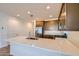 Bright kitchen featuring stainless steel appliances, generous counter space, and modern fixtures at 15760 W Pioneer St, Goodyear, AZ 85338