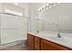 Bathroom features a double sink vanity, updated shower at 16115 W Acacia Ct, Surprise, AZ 85374