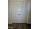 A close-up of the paneled, double doors of the bedroom closet at 16115 W Acacia Ct, Surprise, AZ 85374