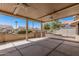 Covered patio with ceiling fans is perfect for enjoying the outdoors at 16115 W Acacia Ct, Surprise, AZ 85374