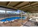 Wonderful backyard showcasing a sparkling pool and a covered patio area at 1620 N 72Nd Ln, Phoenix, AZ 85035