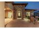 Covered entryway and a view of the outdoor patio with furniture at 16422 W Alvarado Dr, Goodyear, AZ 85395