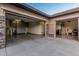 Spacious three car garage with epoxy floors and storage cabinets at 16422 W Alvarado Dr, Goodyear, AZ 85395