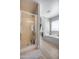 This bathroom features a glass shower and a separate jetted tub, ensuring a relaxing experience at 1673 S 218Th Ave, Buckeye, AZ 85326