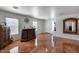 An open-concept living space features warm tile floors, plenty of natural light, and a cozy atmosphere at 1673 S 218Th Ave, Buckeye, AZ 85326