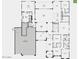 Detailed floor plan showcasing a 5-car garage, primary suite, kitchen, and outdoor living space at 18921 E Ashridge Dr, Queen Creek, AZ 85142