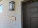 A close-up shot of apartment 2082's front door, showcasing the door's dark color at 1941 S Pierpont Dr # 2082, Mesa, AZ 85206