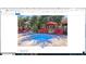 Hot tub surrounded by chairs and umbrellas at 1941 S Pierpont Dr # 2082, Mesa, AZ 85206