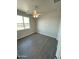 This is a bedroom with a window and a ceiling fan at 22113 W Laura St, Wittmann, AZ 85361