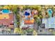 An aerial view of a home with a backyard pool surrounded by lush landscaping at 22402 N 84Th Pl, Scottsdale, AZ 85255