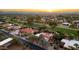 Expansive aerial view showcasing the property's prime location near a golf course and residential neighborhood at 22402 N 84Th Pl, Scottsdale, AZ 85255
