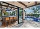 Indoor bar with custom tile and poolside view, perfect for entertaining and relaxation at 22402 N 84Th Pl, Scottsdale, AZ 85255