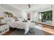 Bright bedroom with tile floors, natural light, and neutral decor at 22402 N 84Th Pl, Scottsdale, AZ 85255