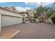Spacious brick-paved driveway with a three-car garage plus an entry gate on this well-maintained property at 22402 N 84Th Pl, Scottsdale, AZ 85255