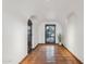 Bright hallway with arched doorways, terracotta tile floors, and stylish architectural details at 22402 N 84Th Pl, Scottsdale, AZ 85255
