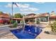 Stunning pool area with lush landscaping, a spacious patio, and a beautiful home exterior backdrop at 22402 N 84Th Pl, Scottsdale, AZ 85255