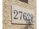 Close-up of home address plaque with easy-to-read numbers at 27629 N 176Th Dr, Surprise, AZ 85387
