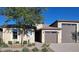 Beautiful single-Gathering home featuring a desert-landscaped front yard and an attached two-car garage at 27629 N 176Th Dr, Surprise, AZ 85387