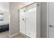 Beautiful bathroom featuring a walk-in shower with sleek glass enclosure and modern fixtures at 2831 W Carson Rd, Phoenix, AZ 85041