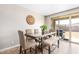 Open dining area with a sliding glass door to the backyard at 2831 W Carson Rd, Phoenix, AZ 85041