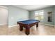 Game room featuring a pool table, neutral paint and light tile flooring at 2831 W Carson Rd, Phoenix, AZ 85041