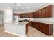 Beautiful kitchen boasting granite countertops, stainless steel appliances, and plenty of cabinet space at 2831 W Carson Rd, Phoenix, AZ 85041