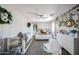 Bright bedroom boasts decorative plants, a crib, and ample natural light at 2912 E Eberle Ln, Phoenix, AZ 85032