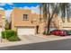 Charming townhome featuring a two-car garage, desert landscaping, and a private entrance for curb appeal at 2912 E Eberle Ln, Phoenix, AZ 85032