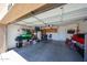 Large garage with ample storage space and access door at 2912 E Eberle Ln, Phoenix, AZ 85032
