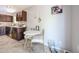 Eat-in kitchen with modern decor, compact design, and minimalist styling at 2912 E Eberle Ln, Phoenix, AZ 85032