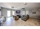 Open living room with tile floors, modern decor, and access to the outdoor space at 2912 E Eberle Ln, Phoenix, AZ 85032