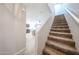 Carpeted staircase leads to a well-lit living area at 2912 E Eberle Ln, Phoenix, AZ 85032