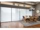 Contemporary dining room featuring a modern chandelier, and neutral wall colors providing an elegant atmosphere at 29854 N 132Nd Dr, Peoria, AZ 85383
