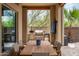 Outdoor dining area with built-in outdoor kitchen and seating provides great space to entertain at 29854 N 132Nd Dr, Peoria, AZ 85383