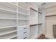 Spacious walk-in closet boasts custom shelving and ample storage space at 3117 E Campbell Ave, Phoenix, AZ 85016