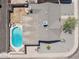 Aerial view of a home featuring a large pool, backyard, and well-maintained landscaping at 3405 S Cutler Dr, Tempe, AZ 85282