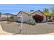 Charming home boasts desert landscaping with vibrant bougainvillea and a sign that says 'Swimming Pool' at 3405 S Cutler Dr, Tempe, AZ 85282