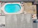 Aerial view of a private backyard pool with patio furniture and ample space for outdoor relaxation and entertainment at 3405 S Cutler Dr, Tempe, AZ 85282