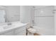 Bright bathroom featuring a tub with shower, neutral tile floors, and modern fixtures at 3974 E Ghost Flower Ln, San Tan Valley, AZ 85140