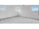 Upstairs bedroom with plush carpeting and multiple windows at 3974 E Ghost Flower Ln, San Tan Valley, AZ 85140