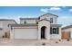 Charming two-story home with a two-car garage and neutral paint, offers a welcoming curb appeal at 3974 E Ghost Flower Ln, San Tan Valley, AZ 85140