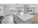 Contemporary kitchen with a spacious island, modern appliances, and an open floor plan at 3974 E Ghost Flower Ln, San Tan Valley, AZ 85140
